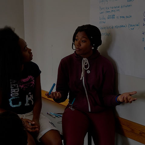 student talking to a class
